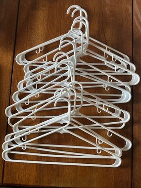 Upgrade your closet with this set of White  Hangers - Multipack 15ct